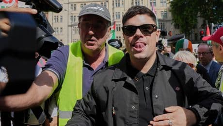 Fans of Irish band Kneecap surround a London court as a band member faces a terror-related charge