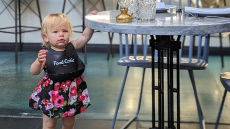 I'm a restaurant reviewer and single mom. I bring my toddler to fancy restaurants to help me review them.