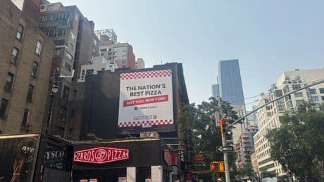 Getting saucy! Connecticut tourism bureau buys billboards in New York City to declare its pizza the best