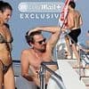 Leo DiCaprio's girlfriend Vittoria Ceretti SPANKS him on yacht vacation... as pair kiss publicly for first time
