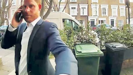 Prince Harry caught on camera knocking WRONG DOOR as he searched for pal after saying he felt unsafe in UK without cops