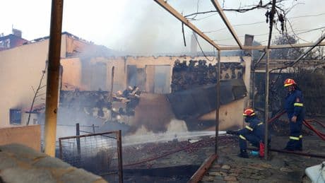 Wildfire burns through northern suburb of Greece's capital Athens and residents are told to evacuate