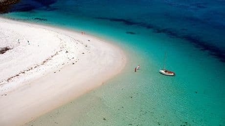 Abandoned UK island with clear water and Caribbean-like beach you can swim to