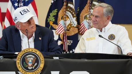 The Latest: Trump lands in Texas to survey flood damage