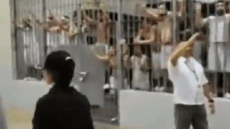 Moment deported Tren de Aragua gang inmates scream and rattle cells at US officials in notorious El Salvador mega-prison