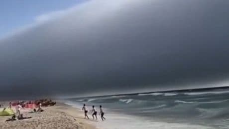 Portugal beaches see rare 'roll clouds' sweep over European holiday hotspot