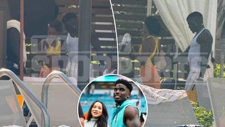 Tyreek Hill gets flirty with mystery woman in pool after wife’s divorce filing