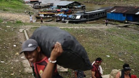 Residents of a remote island disputed by Colombia hope their Peruvian government won't forget them