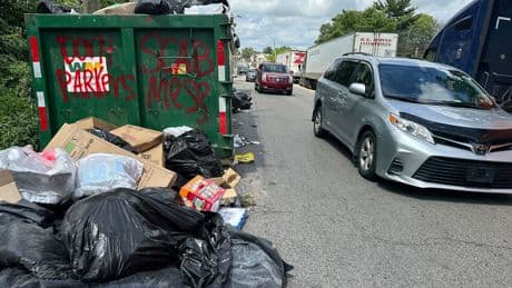 Sanitation workers remain on strike with mounds of trash piling up in several cities