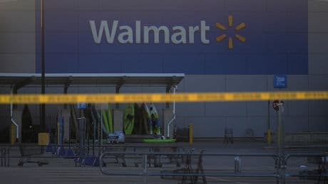 A man accused of stabbing 11 people at a Walmart is in Michigan authorities' custody
