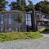 Has the curse been lifted? Notorious £1m Grand Designs eco-flop home that left cash-strapped owners living in a caravan could FINALLY welcome residents...14 years later