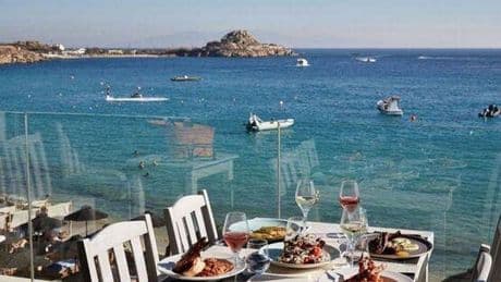 Brits hit with 'heart attack' bill after being lured to 'free' sunbeds on Greek island