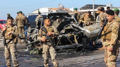 Israeli strikes kill two in Lebanon, Hezbollah chief says 'will not let anyone disarm' it