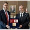Pressure growing on Labour to sack trade envoy after his visit to Northern Cyprus - despite the British Government not recognising the territory