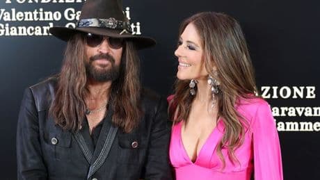 Elizabeth Hurley looks smitten as she makes red carpet debut with Billy Ray Cyrus