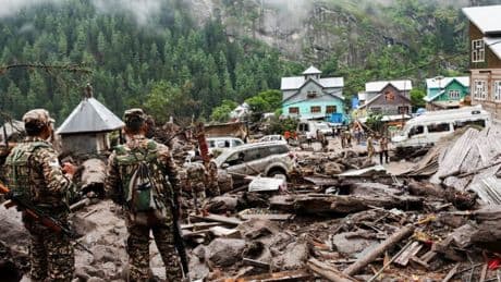 'Doomsday' floods and landslides kill more than 300 in Pakistan and Indian Kashmir with mass funerals held