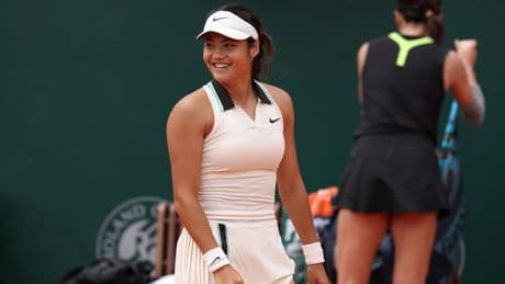 French Open: Emma Raducanu to face Iga Swiatek after battling first-round win at Roland Garros