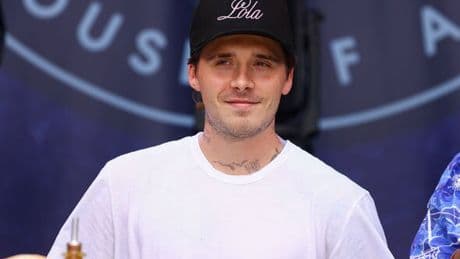 Brooklyn Beckham covers up 'mama's boy' tattoo as 'feud' rages on