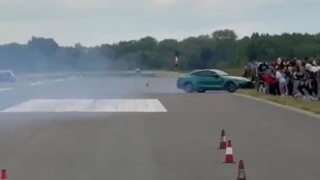 Horror moment car crashes into crowd of spectators leaving at least 15 injured in shocking scenes at drag racing event