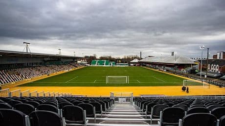 EFL clash is delayed and stadium evacuated as emergency air ambulance lands on pitch after supporter falls ill
