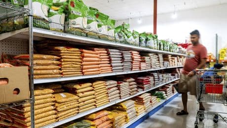 Trump's broad tariffs go into effect, just as economic pain is surfacing