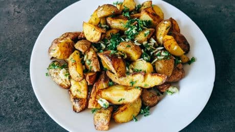 The Secret Step Chefs Add For Fluffy, Crispy Potato Wedges