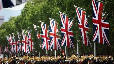 Thousands of people gather near Buckingham Palace to mark the 80th anniversary of V-E Day