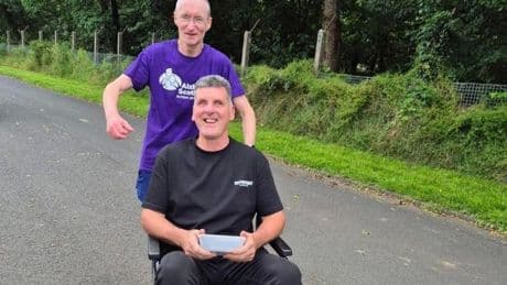Heartwarming moment Scot completes 'wheelchair marathon' pushing mum with Alzheimer's