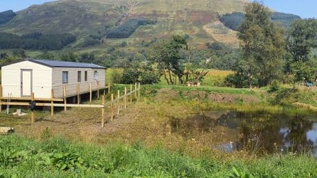 National Park enforces action against owner for unauthorised static caravan setup