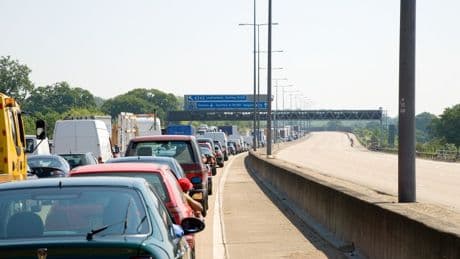 Major motorway closed after van erupts into flames – sparking more bank holiday travel chaos as 18m drivers hit the road