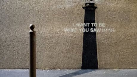 Banksy reveals new work featuring lighthouse and mysterious message