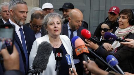 French PM to reconsider reform in standoff with taxi drivers