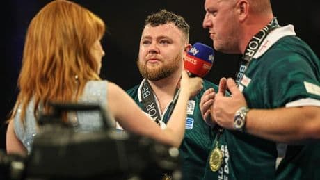 Josh Rock bursts into tears on rival's shoulder after clinching famous World Cup for Northern Ireland with Daryl Gurney