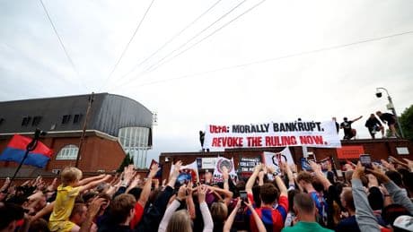 'Morally bankrupt': Crystal Palace fans march to Selhurst Park in protest at Europa League relegation