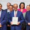 Merz: "Dinge zum Guten wenden": Union und SPD unterzeichnen Koalitionsvertrag
