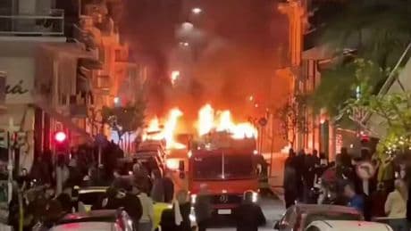 Shock vids shows Athens turned into WARZONE as petrol-bomb armed mob attack police with 21 cars torched & 72 arrested