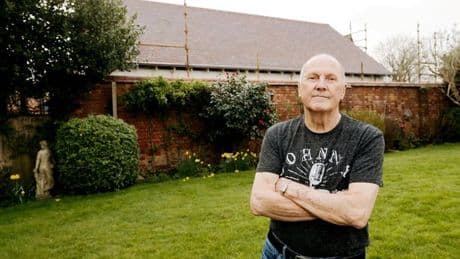 Fuming pensioner returns from holiday to find two-storey 'eyesore' at end of garden
