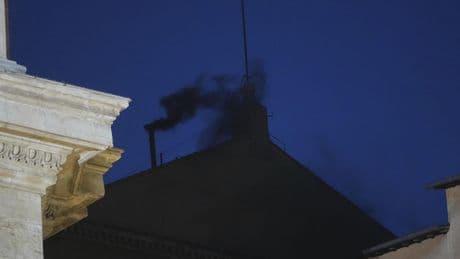 Black smoke pours from Sistine Chapel chimney, indicating conclave hasn't elected pope