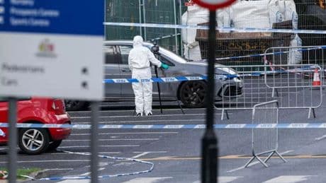 Man arrested at airport after teen, 19, 'stabbed to death' at football complex