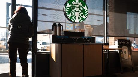 Starbucks is embracing a tough cost-cutting method that's led workers elsewhere to bring their own coffee to work