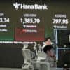 Asian shares track Wall Street's rally after Powell hints at rate cuts