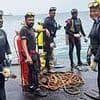Lawyer claims state-owned oil company may have blocked efforts to rescue divers trapped inside underwater pipe because it was 'cheaper to allow them to die'