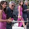 Amal Clooney, 47, cuts an elegant figure in a pink thigh-split dress as she and her dapper husband George, 64, head out for dinner in Lake Como