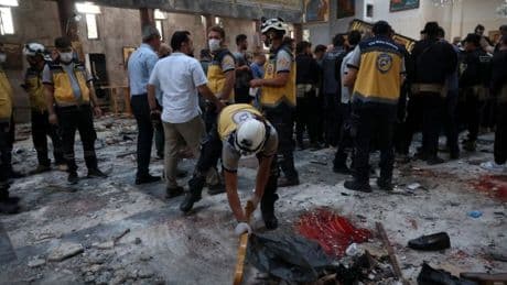 Dozens killed and injured after suicide bomber attack on Greek Orthodox Church in Syria