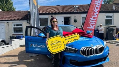 Kiltwalk hero wins £30k car prize amid 'toughest year' for family