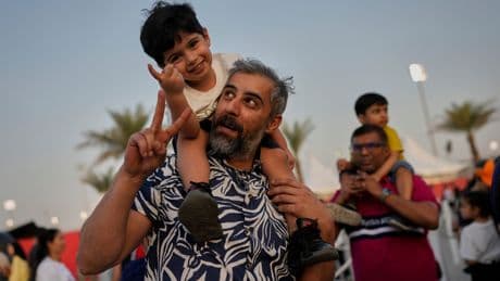 AP PHOTOS: Formula One fans flock to Bahrain for the first race of the season in Mideast