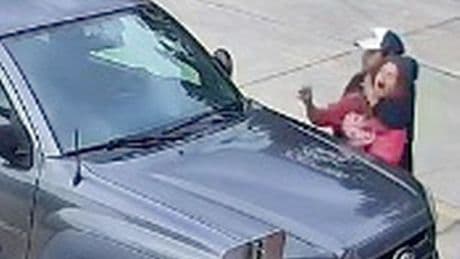 Chilling moment man drags woman into truck as police issue urgent warning