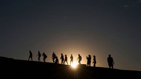Searing heat draws visitors to California's Death Valley, where it's tough to communicate the risks