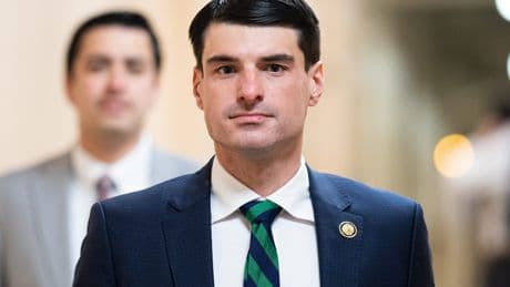He said he'd ban stock trading in Congress. He's made more than 530 trades since taking office.