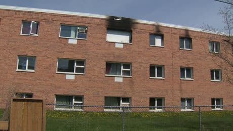 Person hanging from window rescued, 2 in critical condition after Winnipeg fire